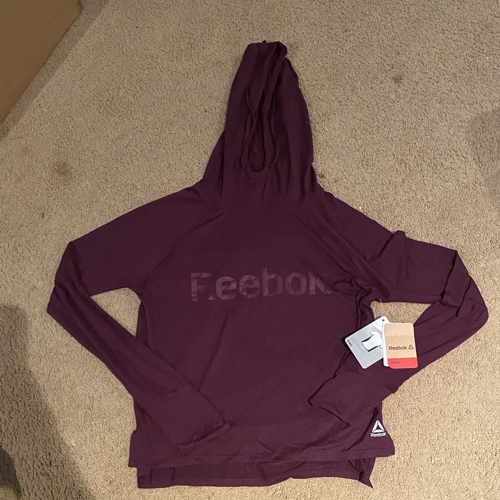 very soft reebok long sleeve with hood.